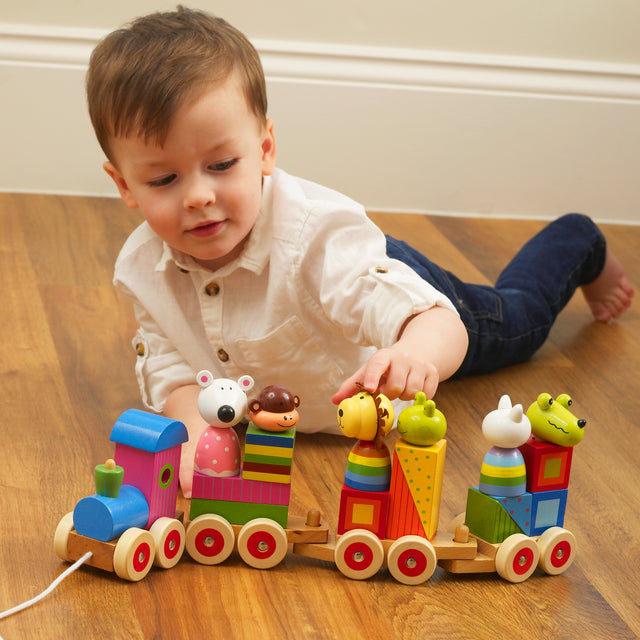 animal puzzle train lifestyle image wooden toy with small child playing indoors